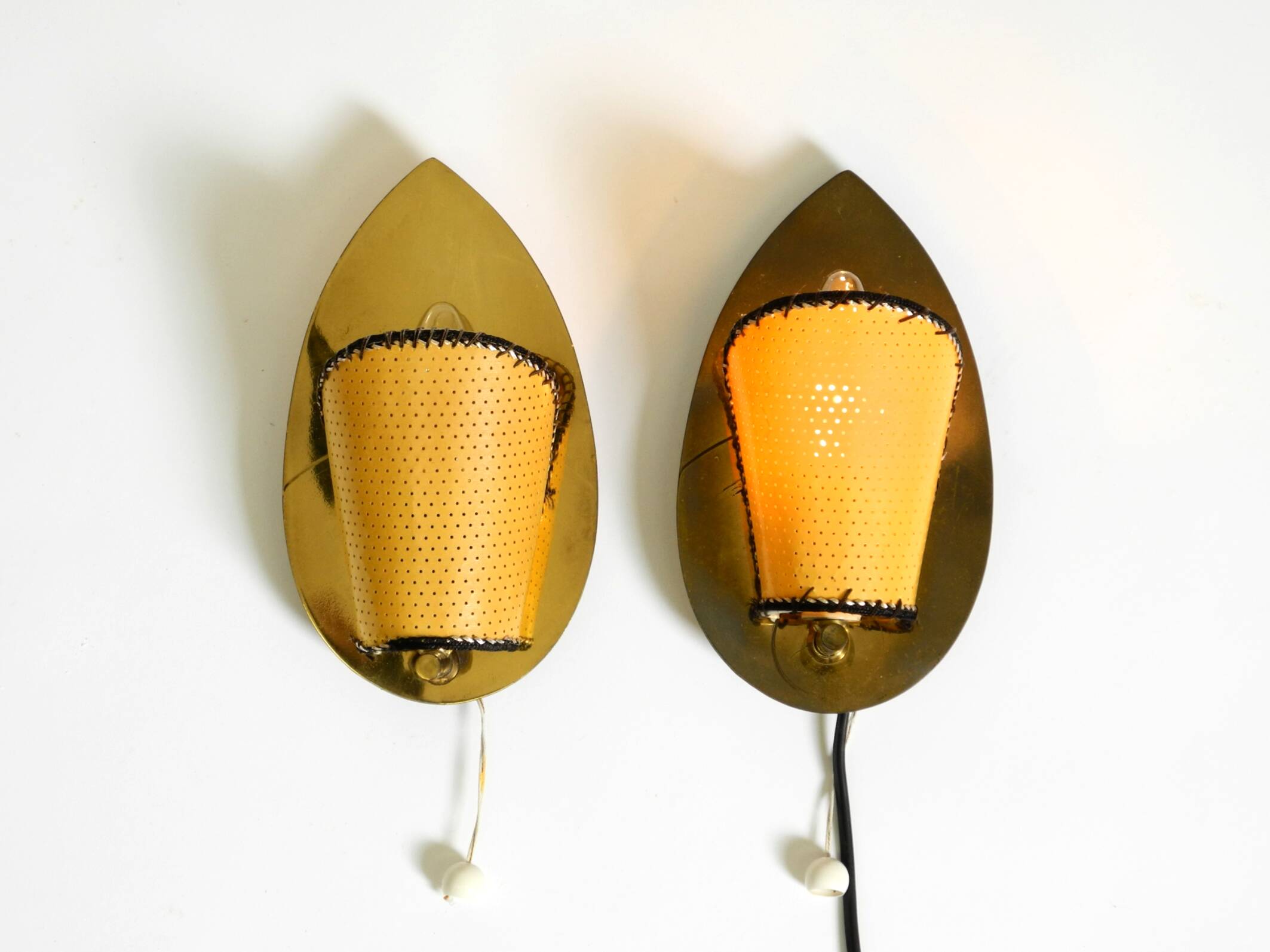 Two enchanting original Mid Century Modern brass wall lamps