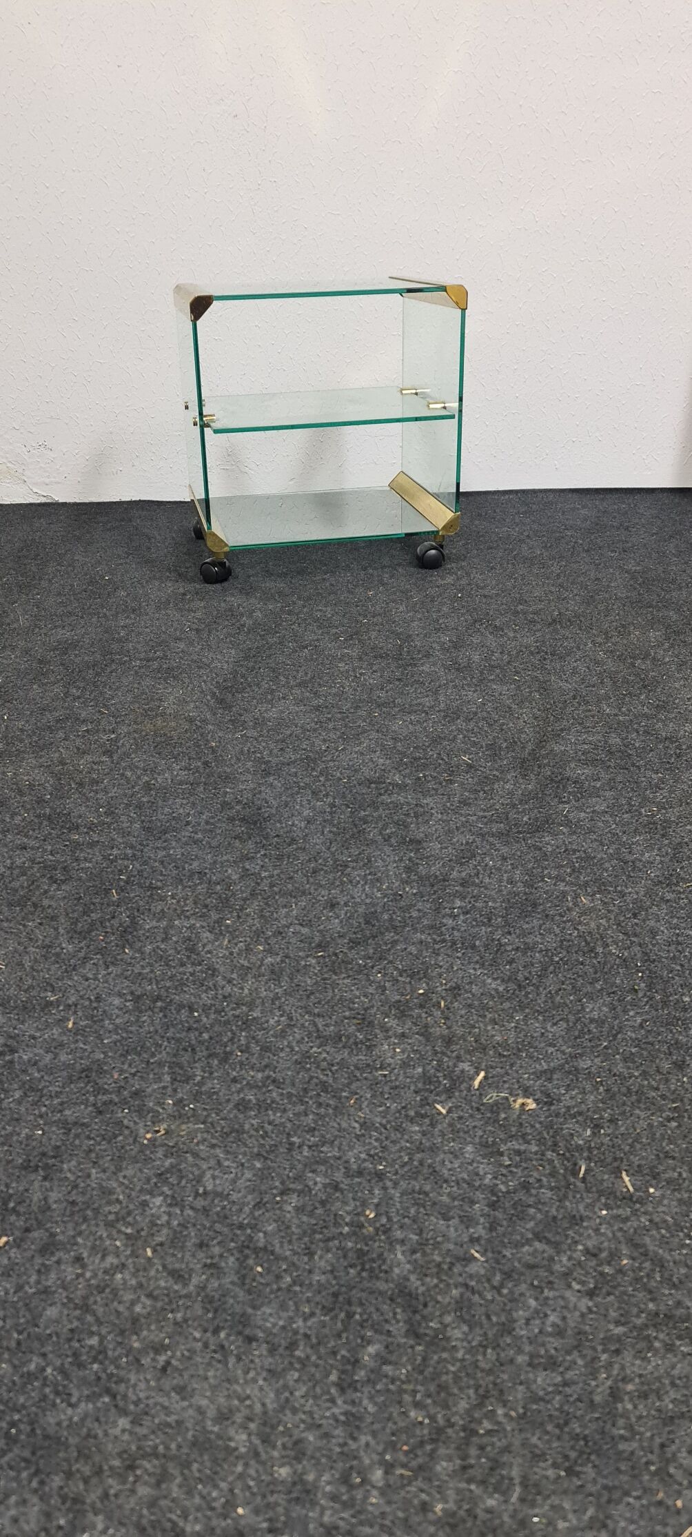 Vintage glass sidetable on wheels