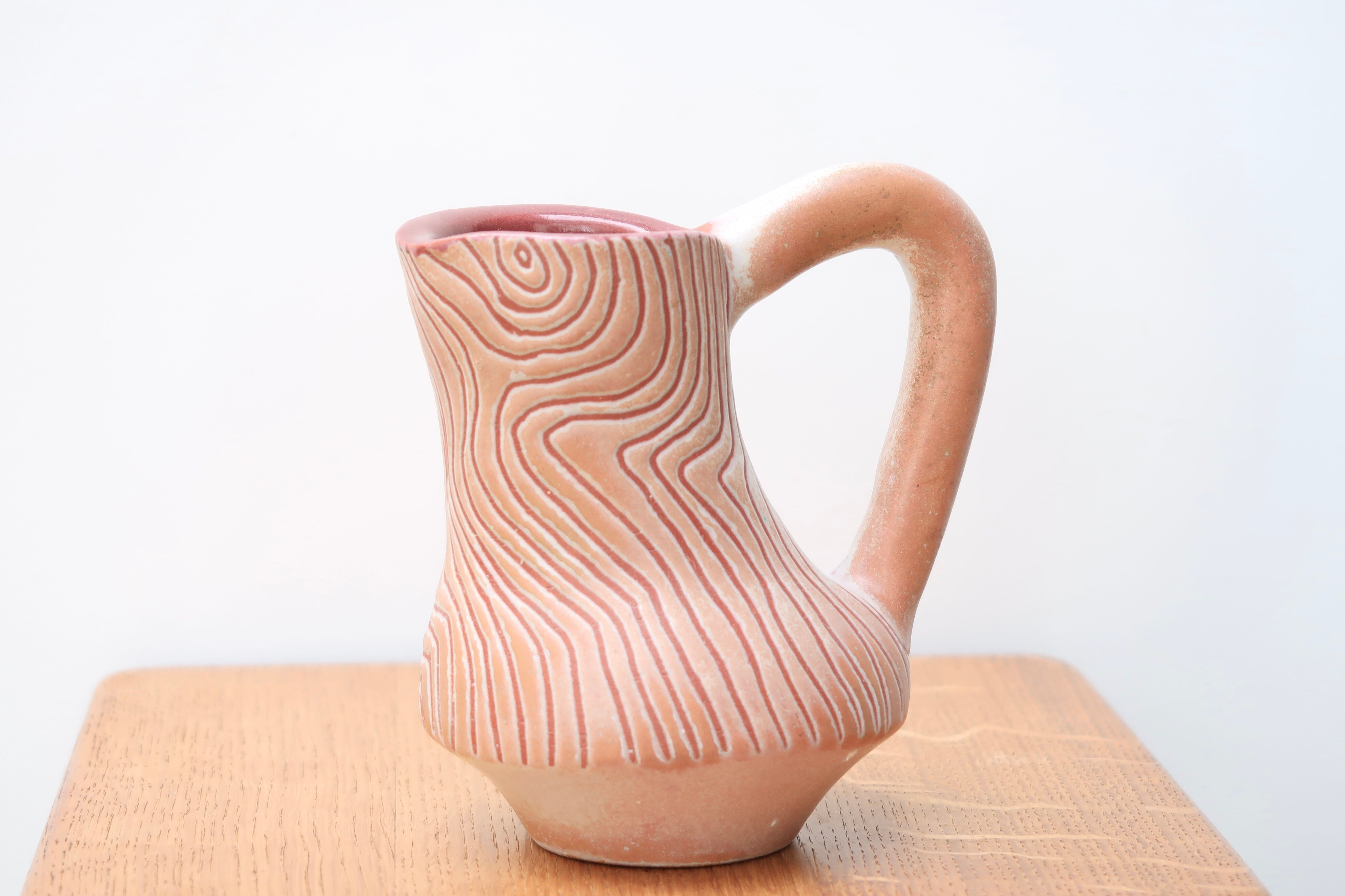Pink scarified pitcher by Henry Algan, 60s