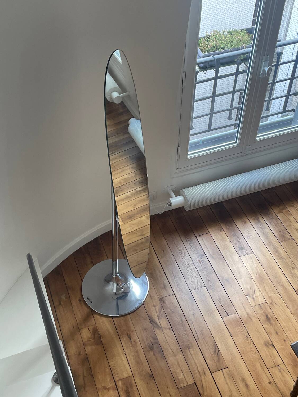 Space age standing mirror