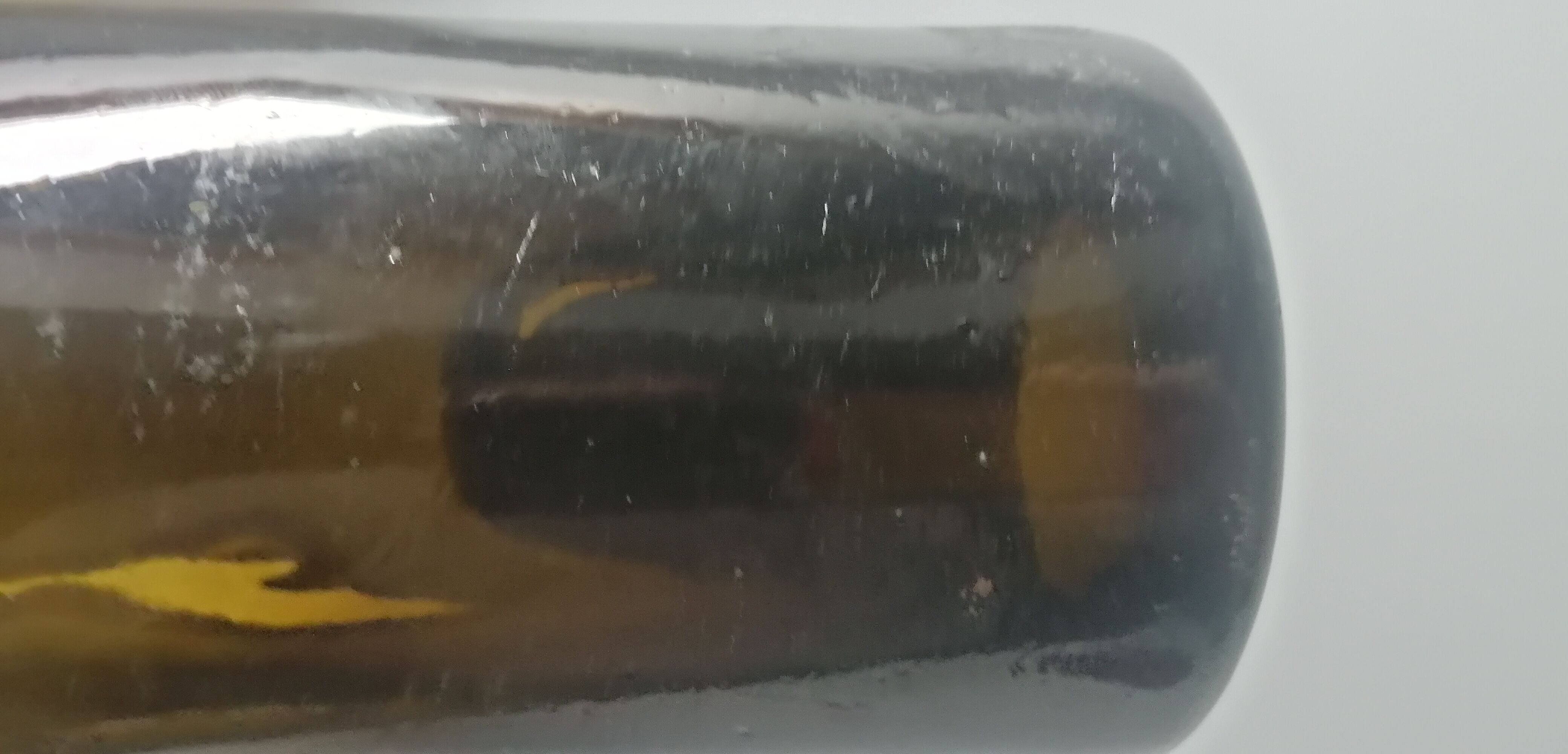 Old bottle made of blown glass