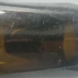 Old bottle made of blown glass