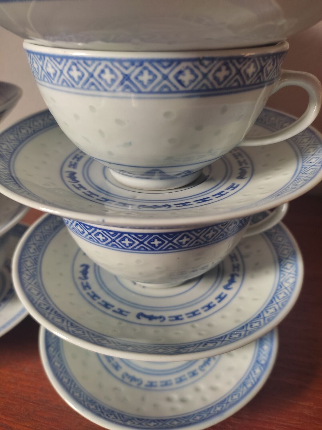 11 cups and saucers in vintage Chinese porcelain