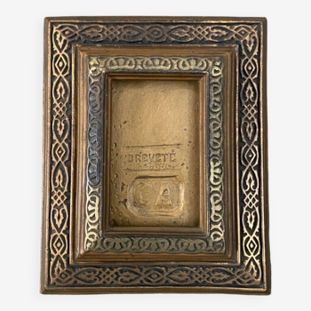 19th century black and gold ebonite frame