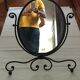 Swivel oval mirror 38x45 cm