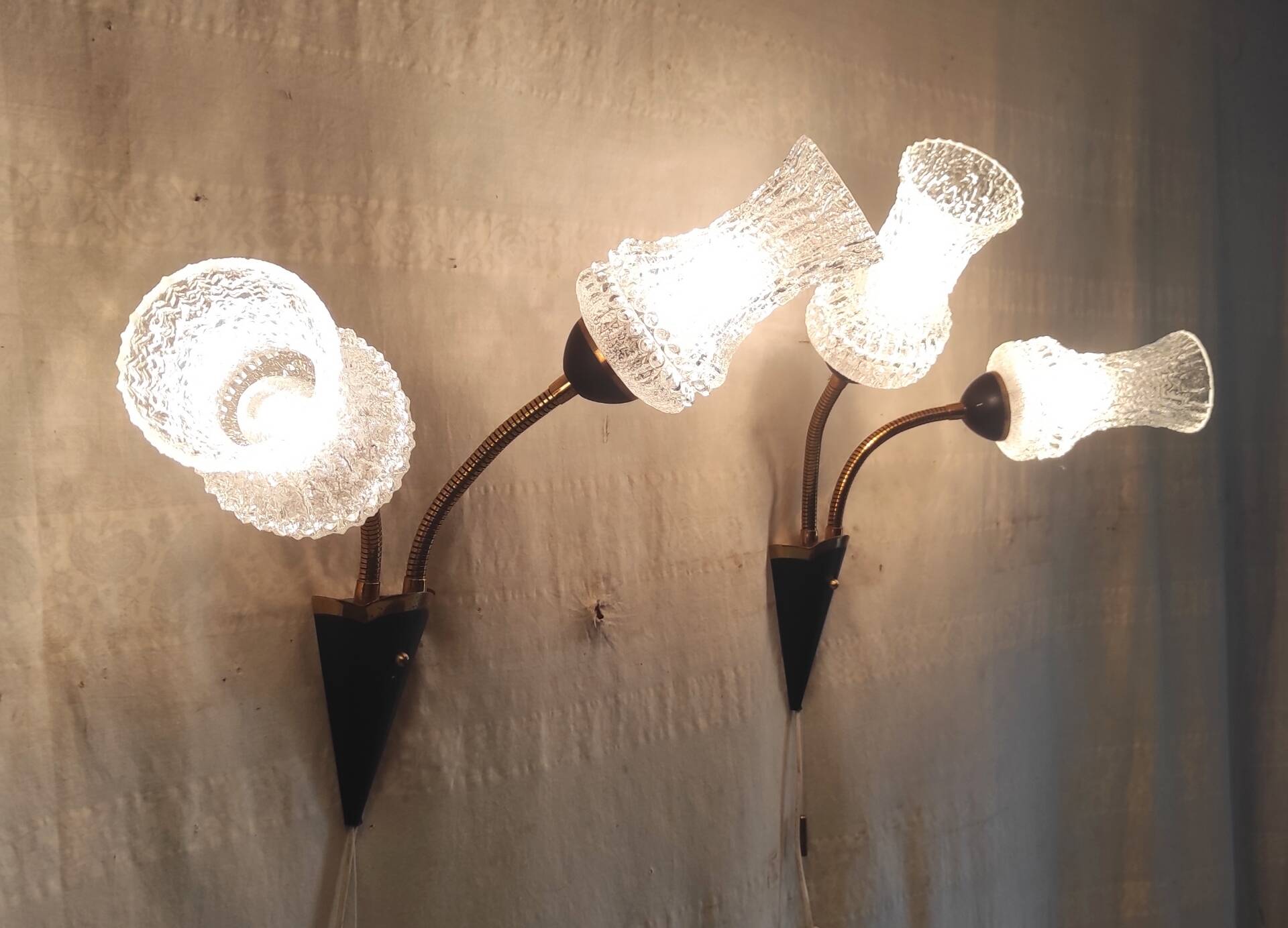 Articulated double light wall sconces in brass and glass - mid 20th century.
