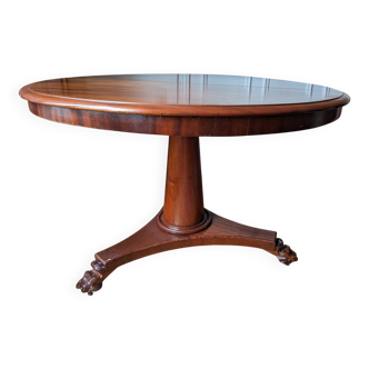 Round mahogany table with extensions