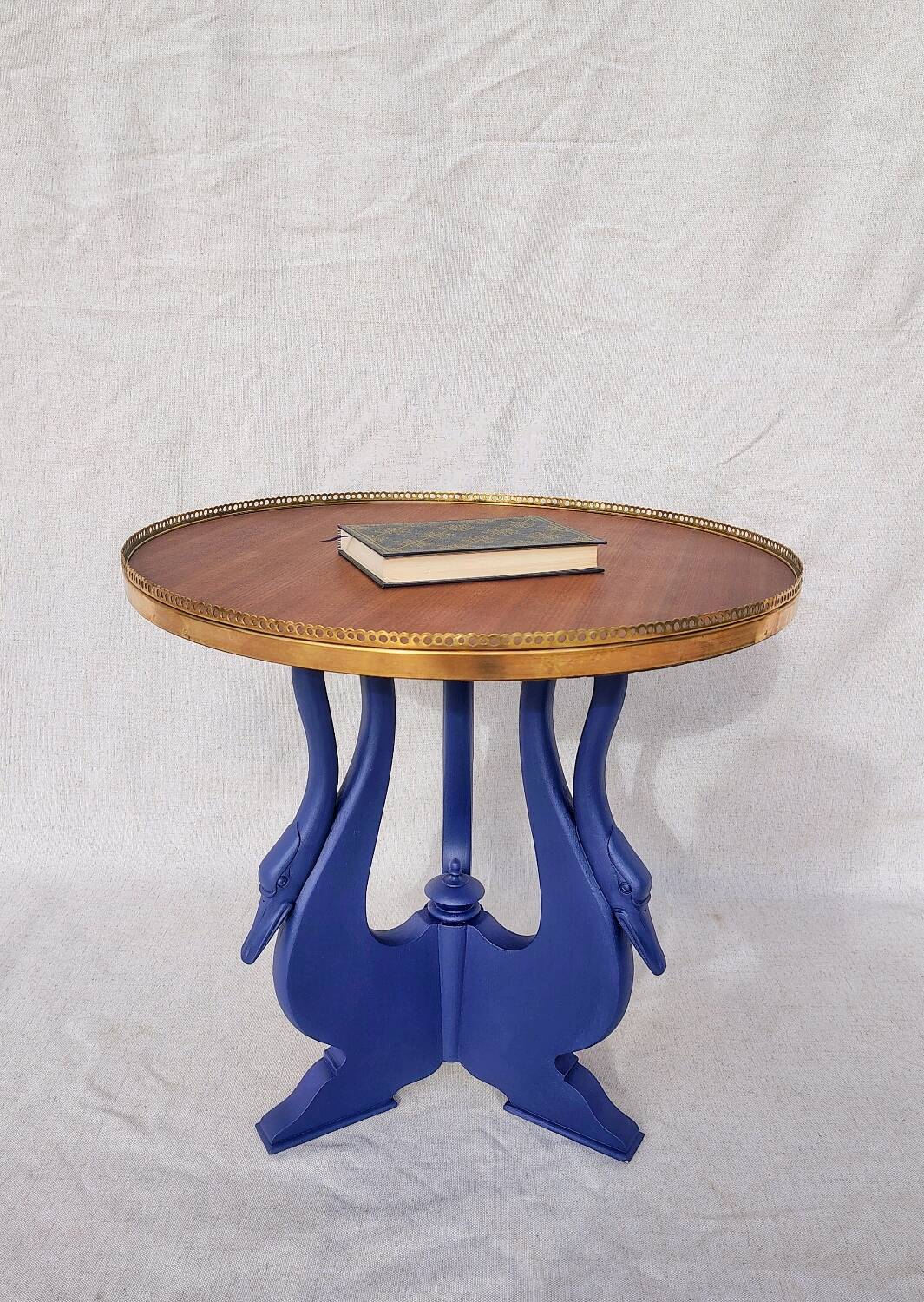 Side table with swan legs