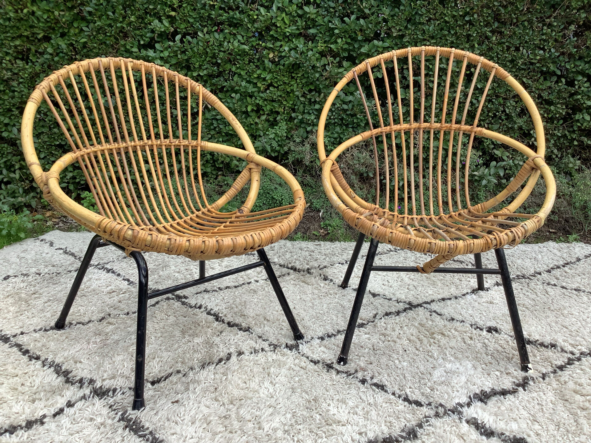 Pair of children's armchairs in rattan from the 1960s.
