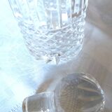 Small round carafe in highly worked cut crystal with stopper
