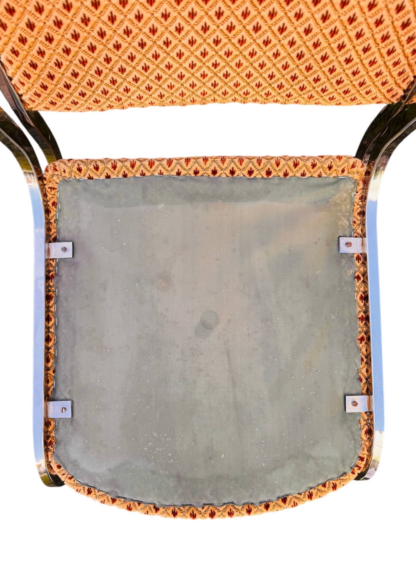 Set of 4 vintage sled chairs from the 1970s