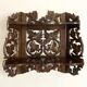 Carved wooden wall shelf