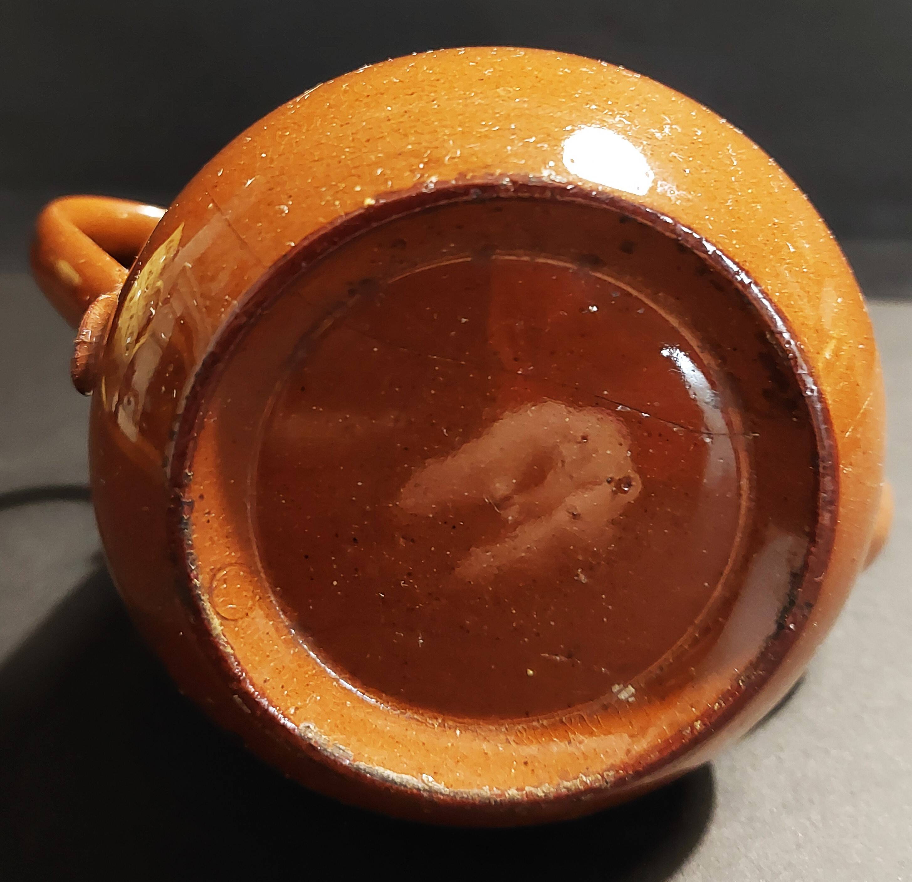 Beige and brown earthenware teapot with pewter lid, early 20th century