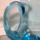 Old blue blown glass pitcher with vintage handle