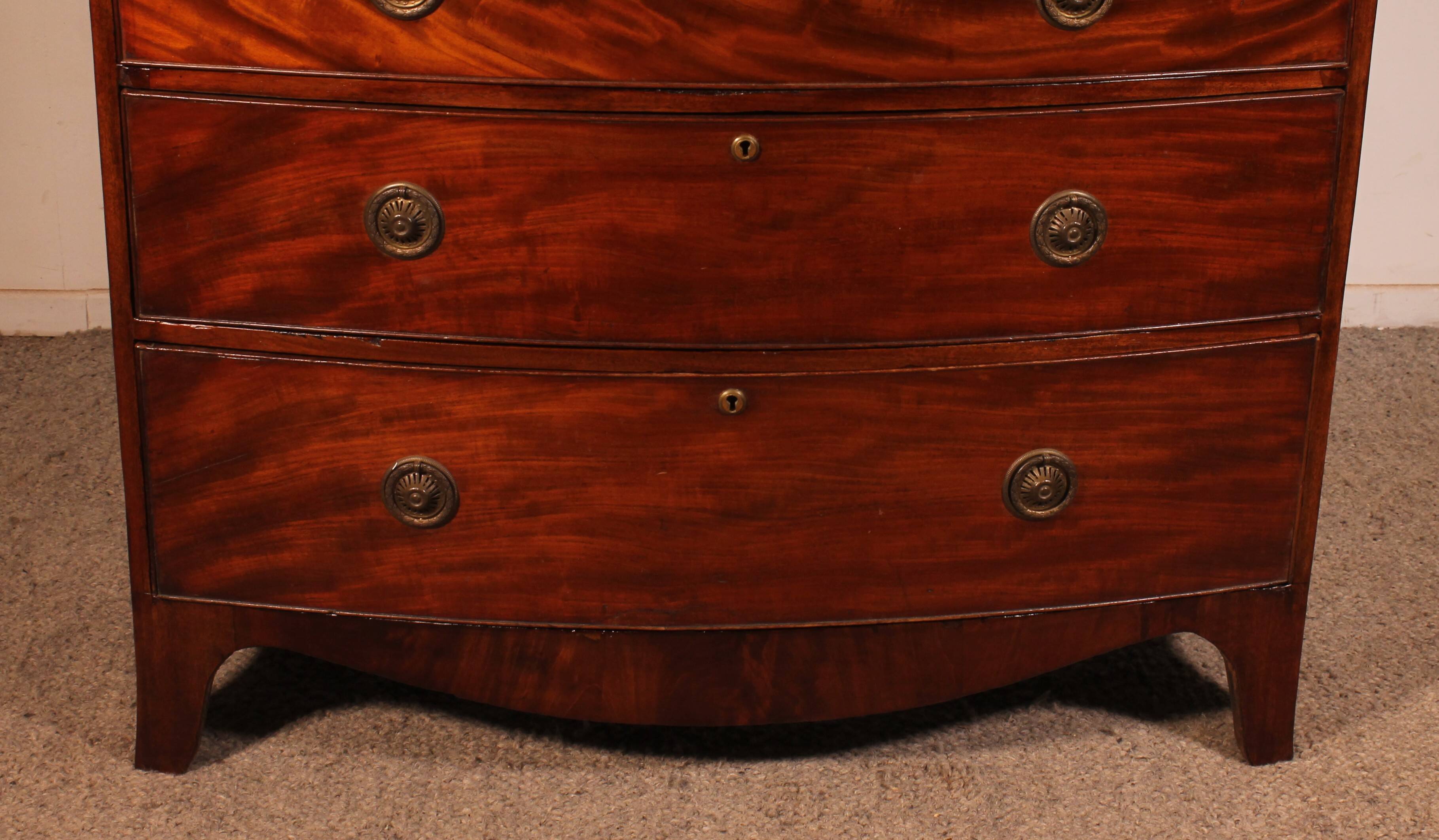 Regency period bombé commode in mahogany
