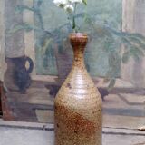 Bottled sandstone vase with a narrow neck