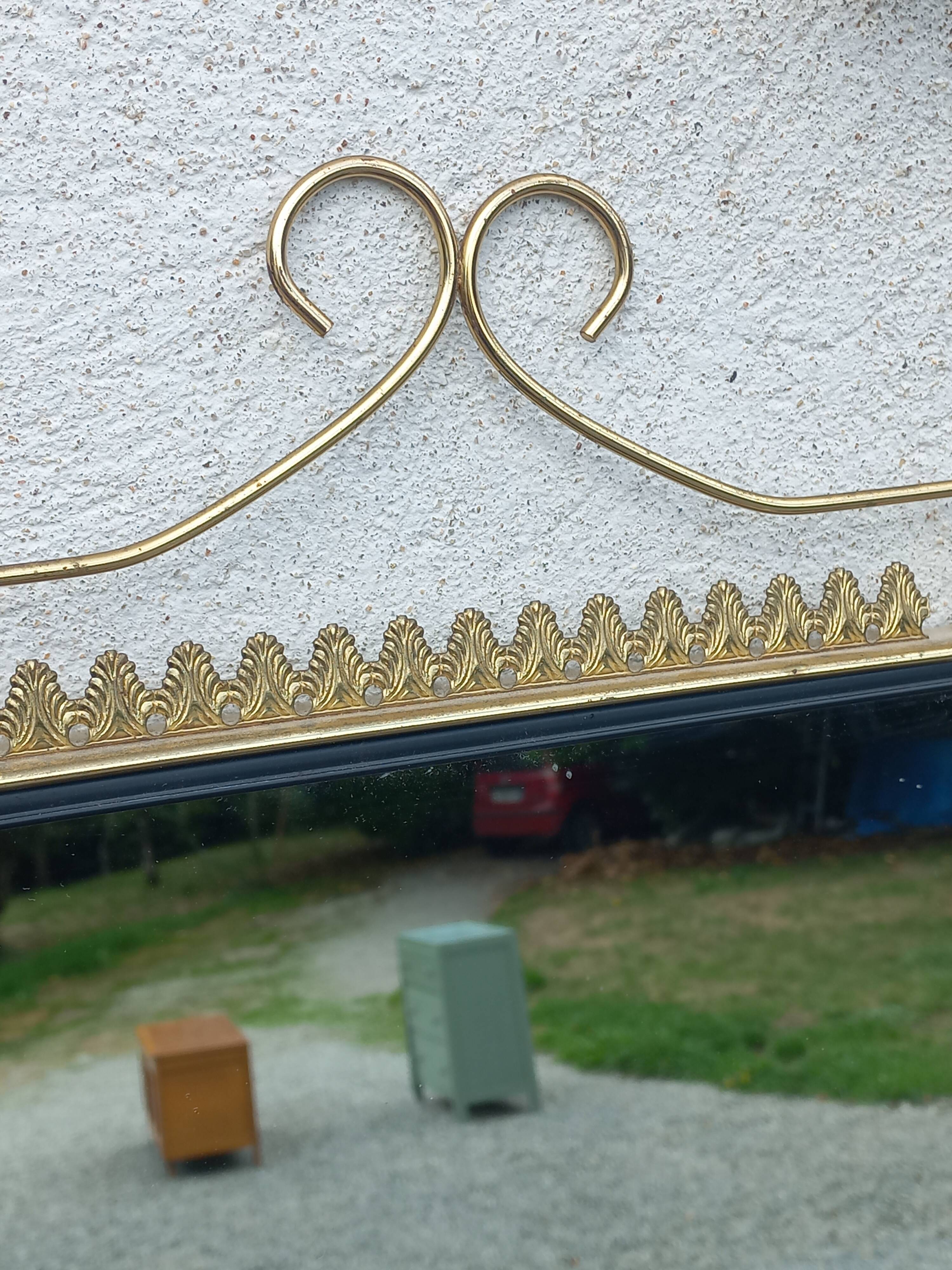 Vintage 1950s neoclassical style gold metal mirror