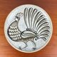 Vintage wall plate in West German pottery with rooster design, 1970s.