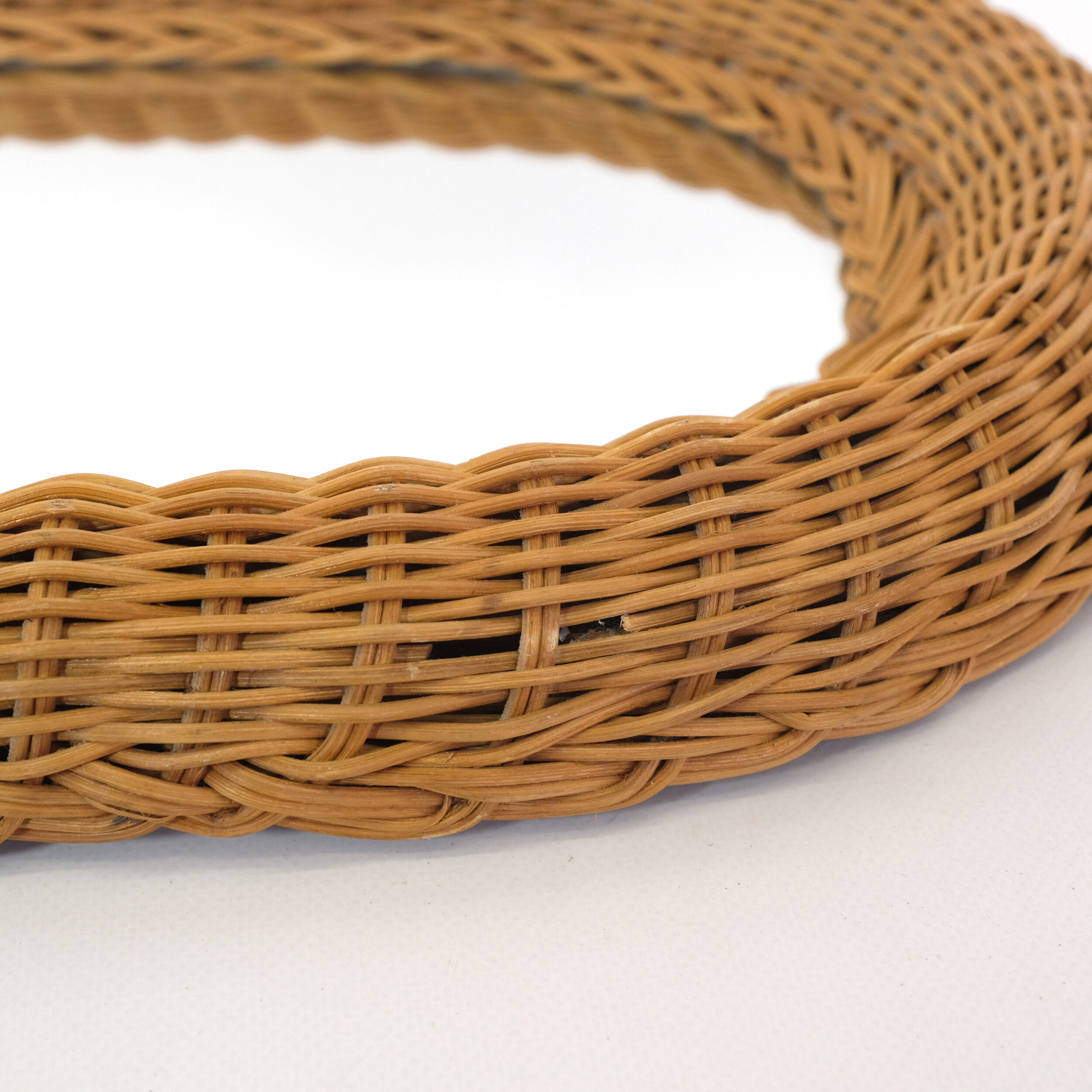 Mirror with thick wicker frame, 54x38 cm.