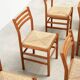 Set of six walnut and rattan dining chairs