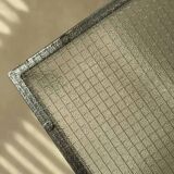 Minimalist 1960s wire glass coffee table in stainless steel.