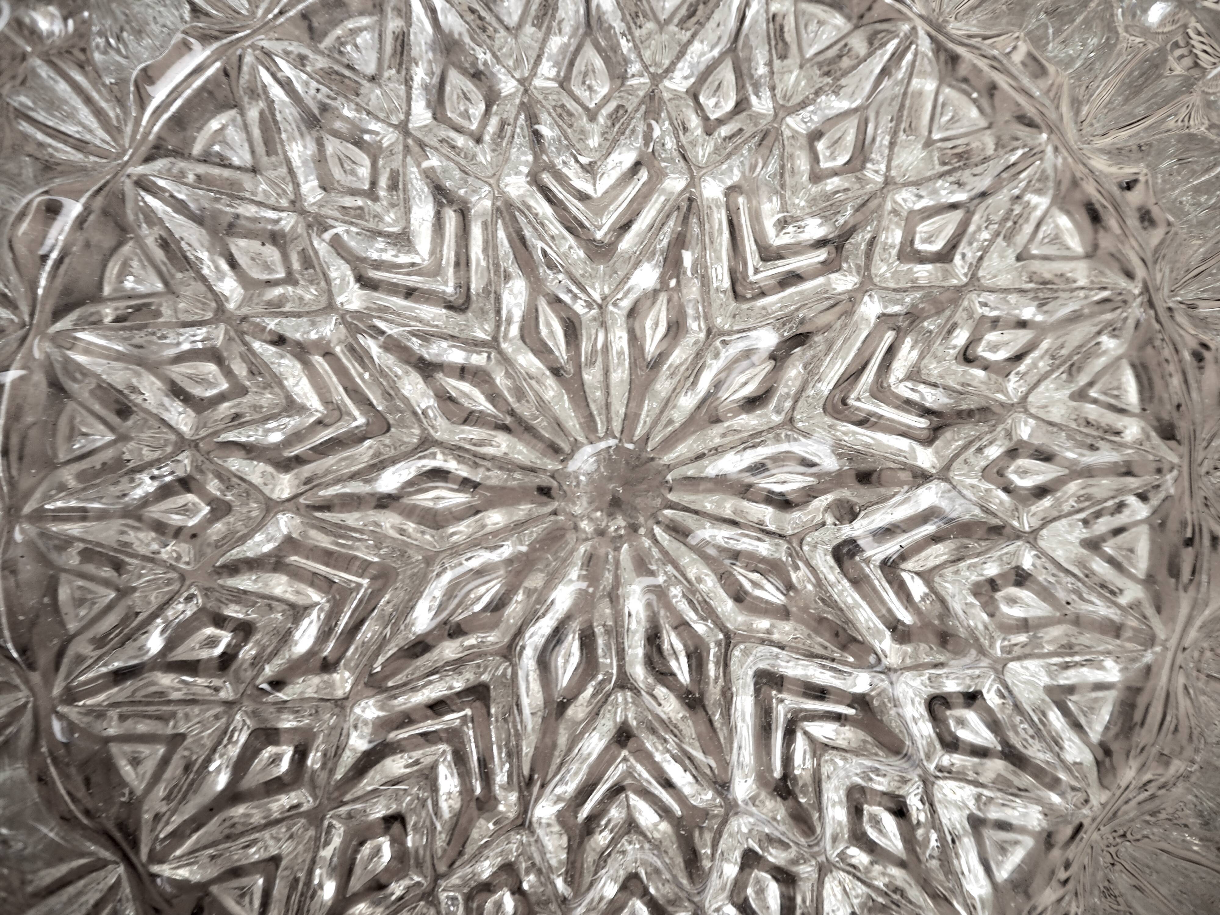 Pair of round ceiling lights in chiseled glass
