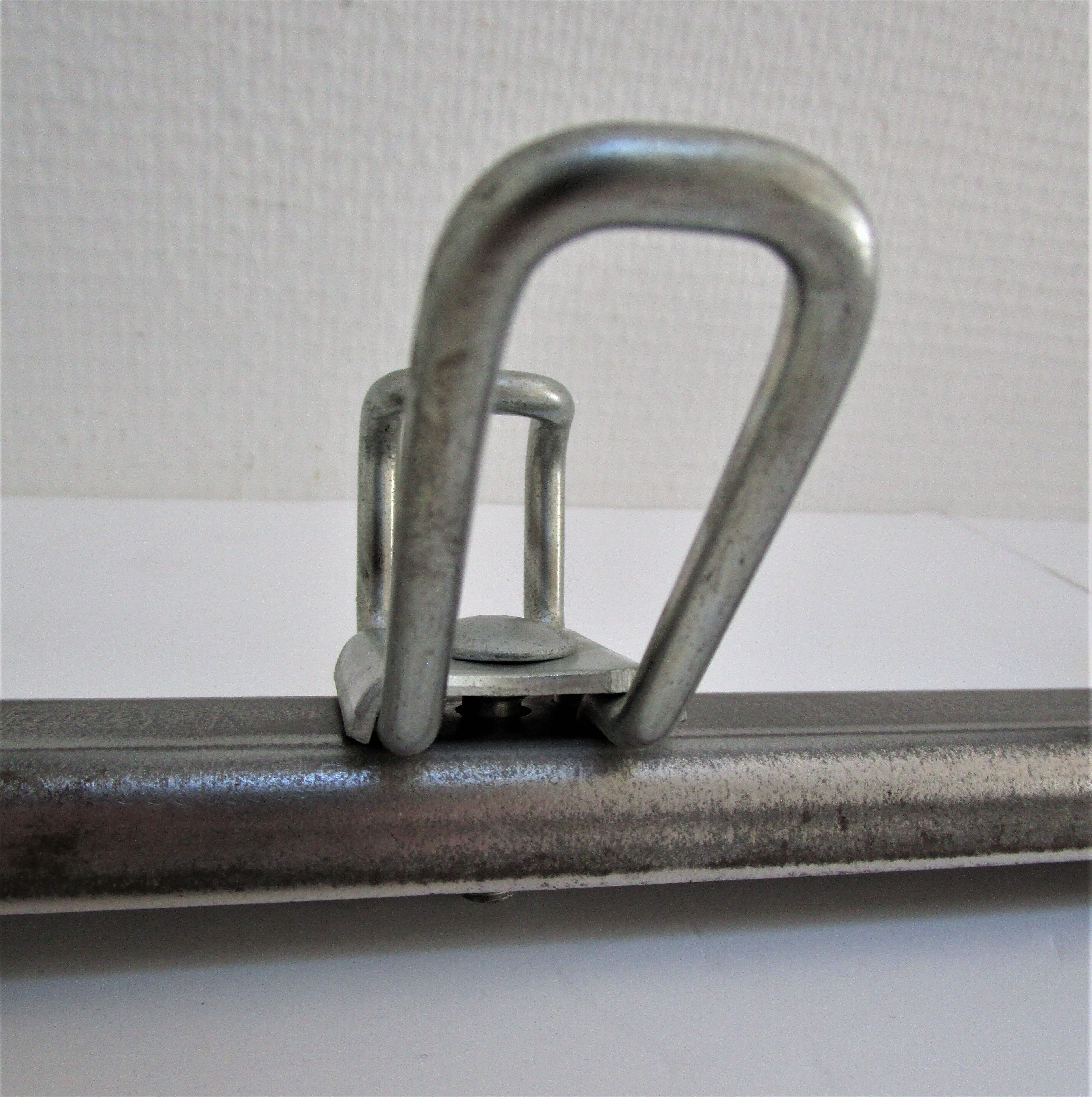 Vintage school wall rack in patinated steel