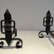 Pair of Wrought Iron Andirons with Obelisk and Belt Motifs