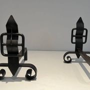 Pair of Wrought Iron Andirons with Obelisk and Belt Motifs