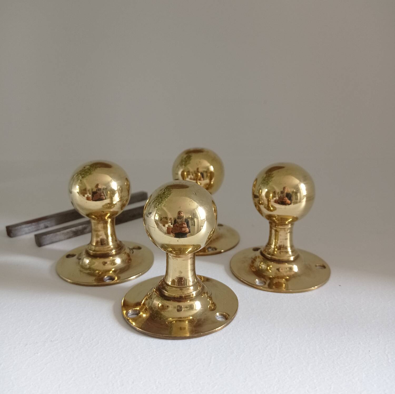 Round brass door handles