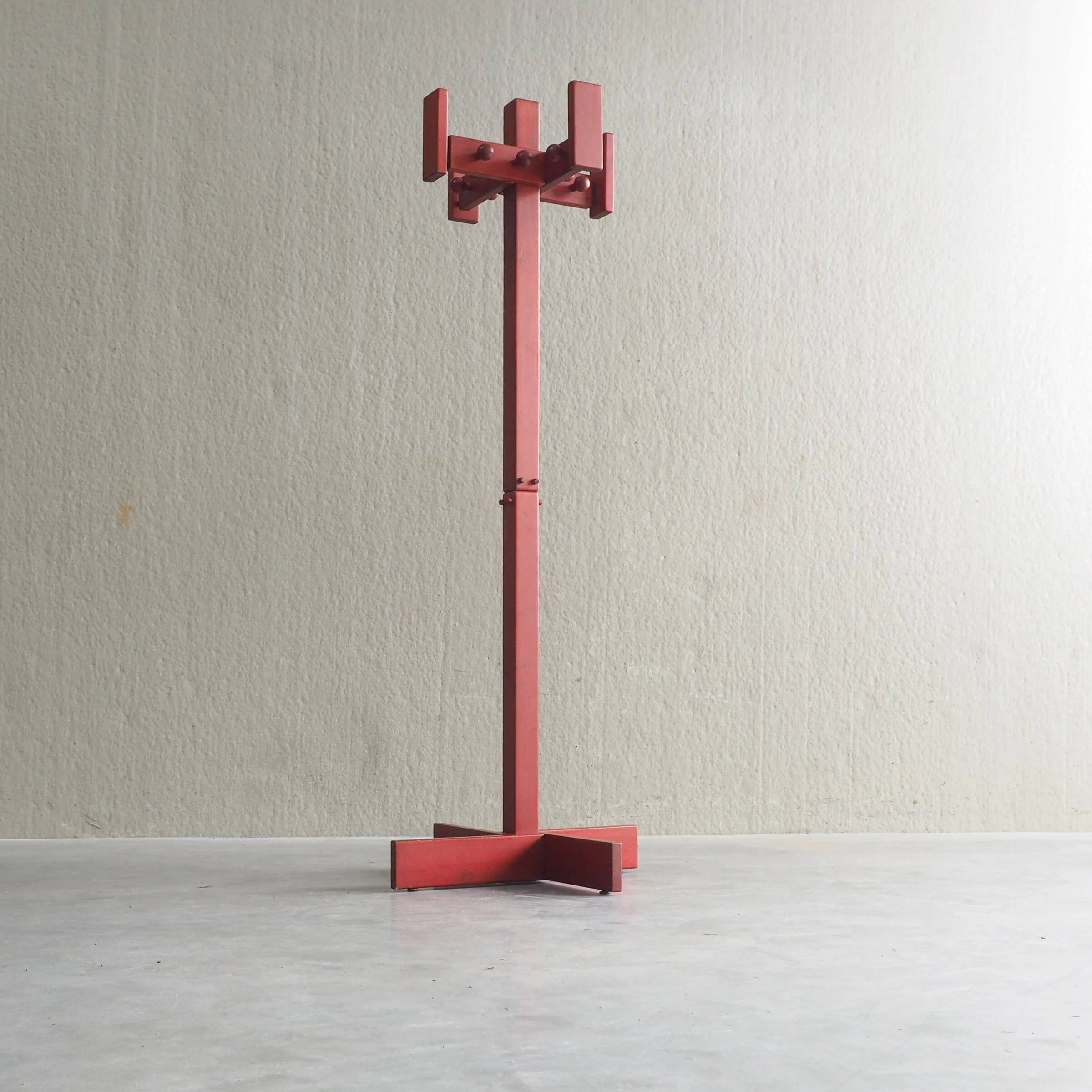 Postmodern red stained pine wood coat hanger