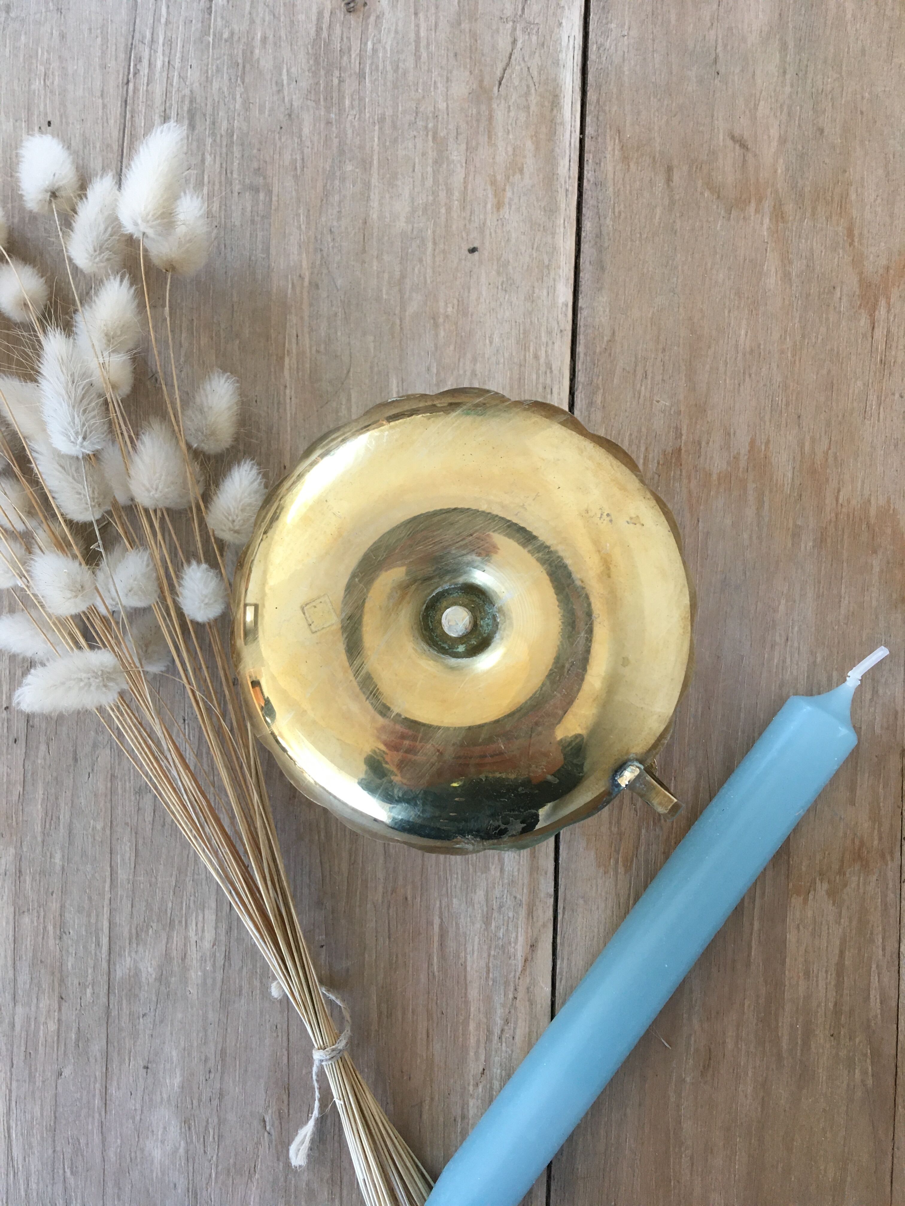 Brass cellar rat candle holder