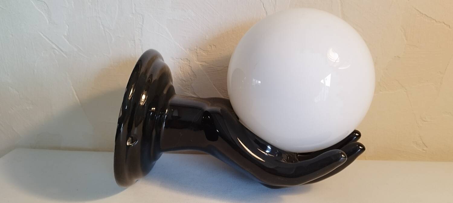 Hand-shaped wall light