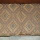 Vintage leather sofas by Thomas Lloyd with Kilim cushions.