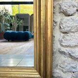 Antique mirror 136.5/98cm Louis-Philippe pearl-gilded with gold leaf.