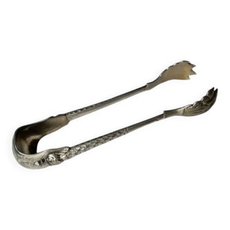 Engraved sugar tongs in solid silver with Minerva hallmark and lion's claws