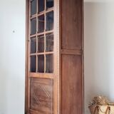 Old glass-fronted library in solid wood