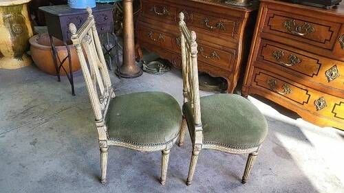 Pair of Louis XVI style chairs from the 18th century with lyre back.