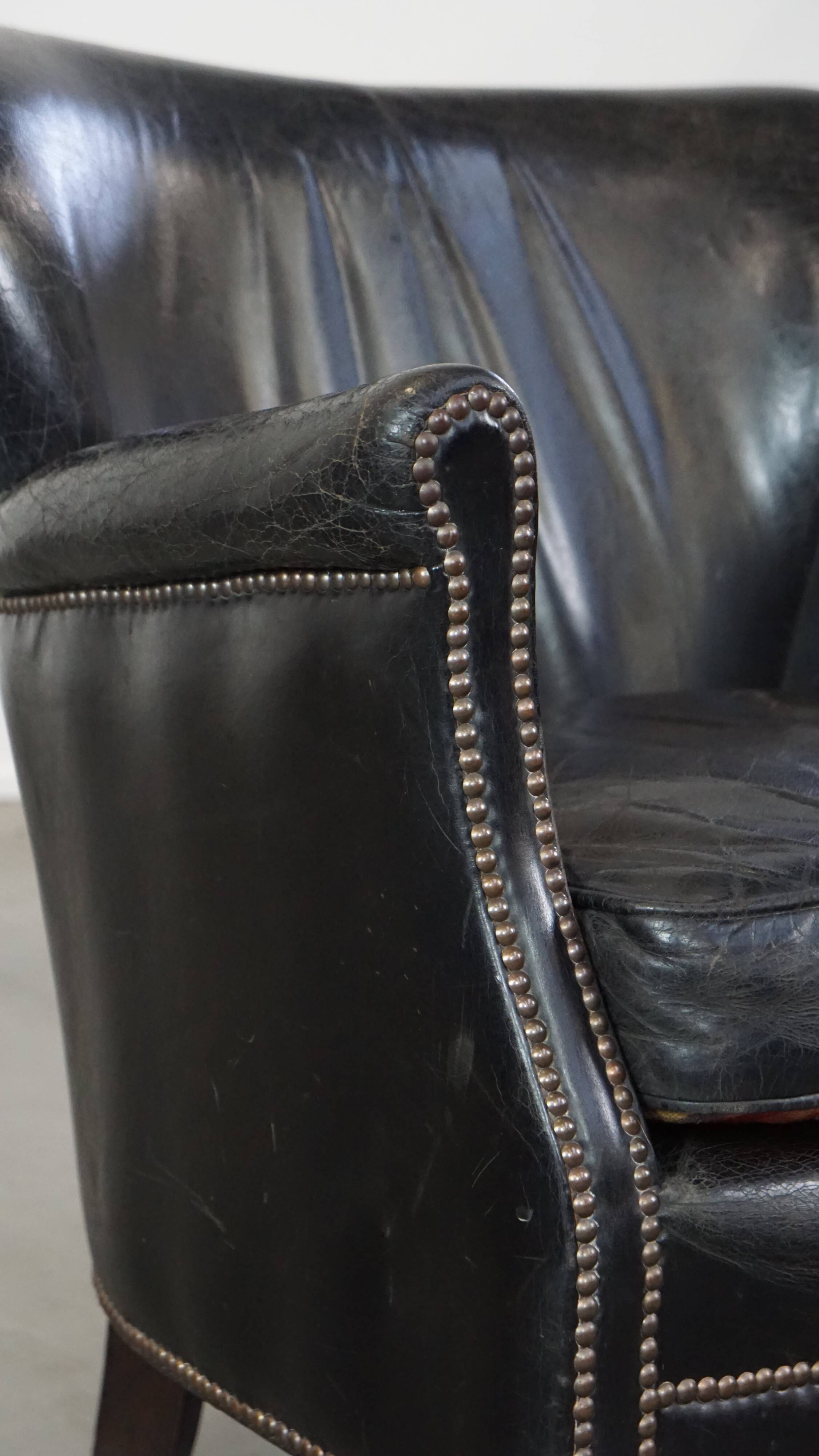 Fauteuil en cuir de vachette noir