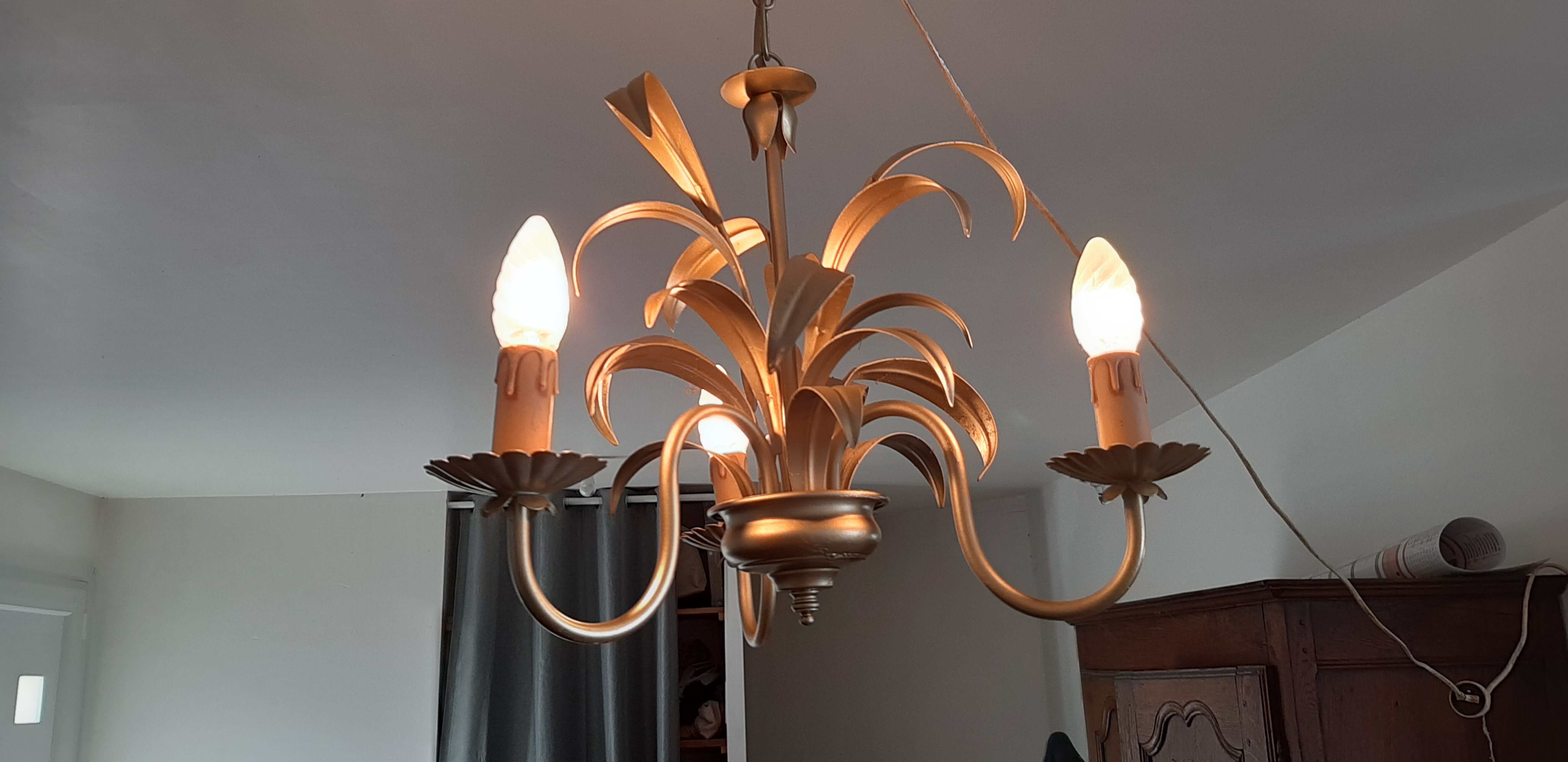 Vintage chandelier in golden metal