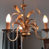 Vintage chandelier in golden metal