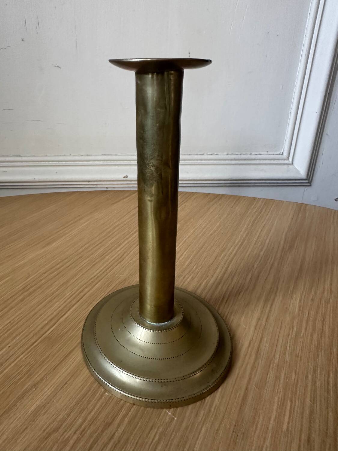 Old brass pull candle holder