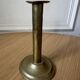 Old brass pull candle holder