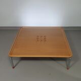 Rare coffee table 110 x 110 x height 35 cm with 8 flange wooden / cork caps in the glass top.