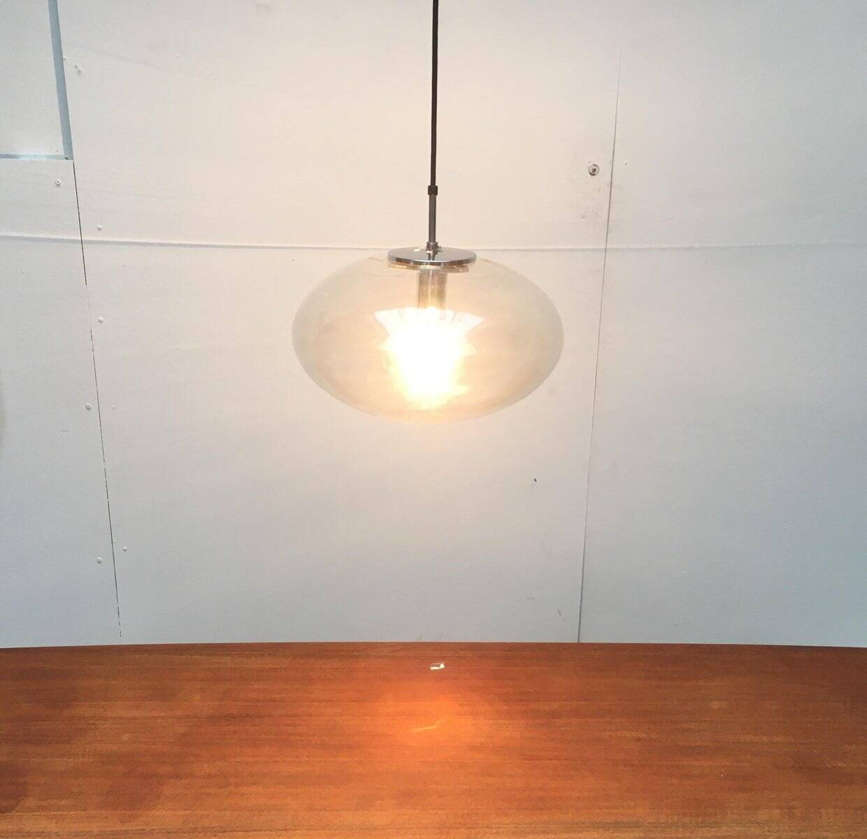 Suspended UFO-shaped glass luminaires in mid-century German Space Age style, set of 3.