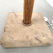 Sculptural floor lamp in bent rattan