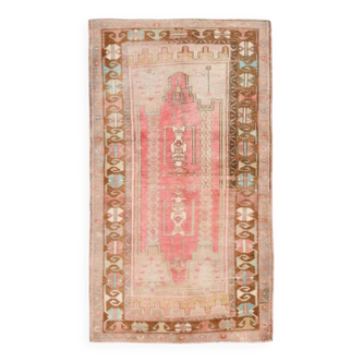 Tapis persan rose et marron