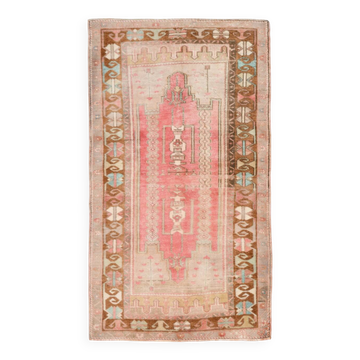 Tapis persan rose et marron