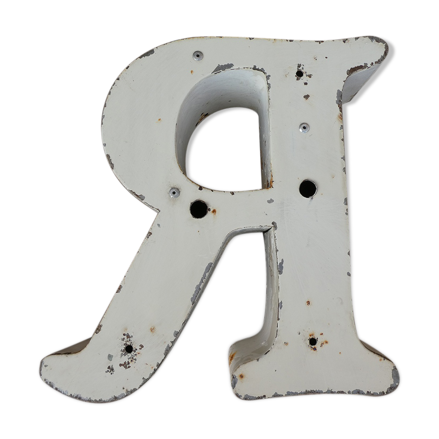 Letter "R" of vintage industrial brand in iron