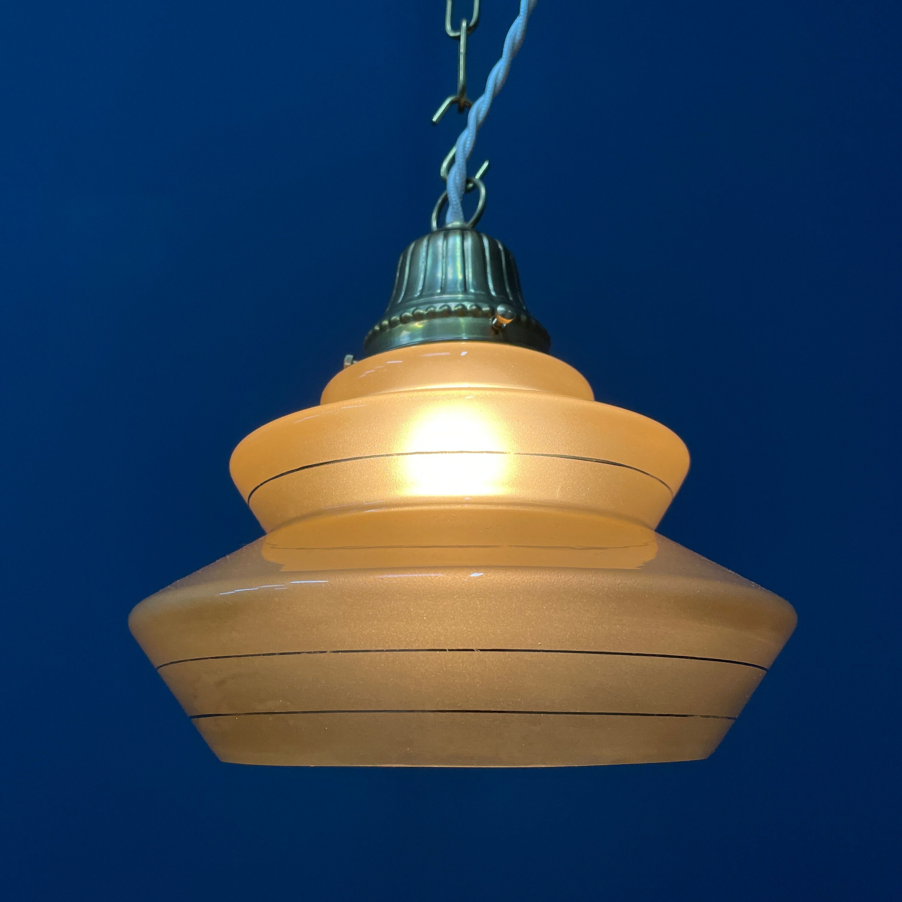 Vintage ocher glass hanging lamps with brass gallery